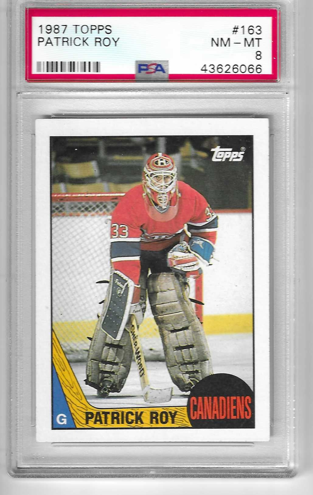 Hockey trading card of Patrick Roy with Topps branding, framed by a protective case.